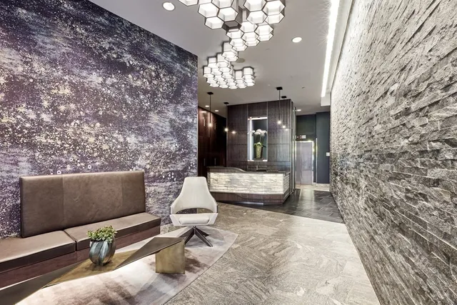 a view of lobby with mirror