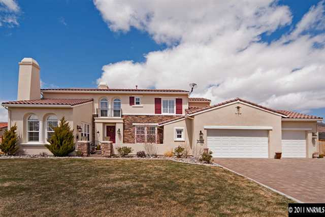 8541 Timaru Trail Reno, NV 89523 - Photo 1 of 13 a front view of a house with a garden