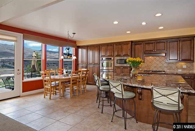 8541 Timaru Trail Reno, NV 89523 - Photo 6 of 13 a view of a dining room with furniture window and outside view