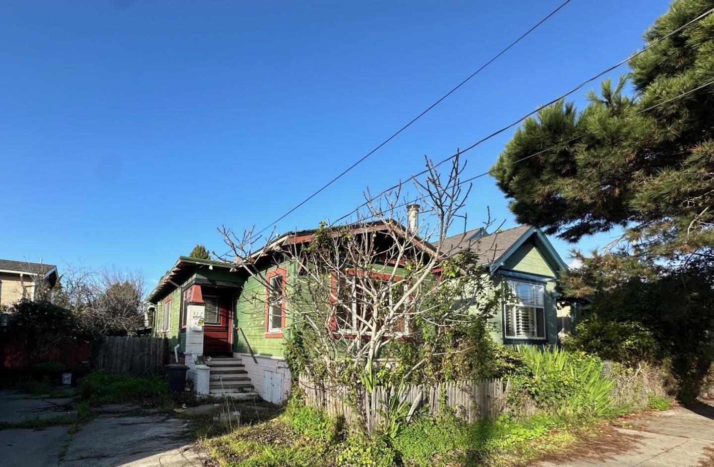 917 Channing Way Berkeley, CA 94710 - Photo 1 of 15 a front view of a house with garden