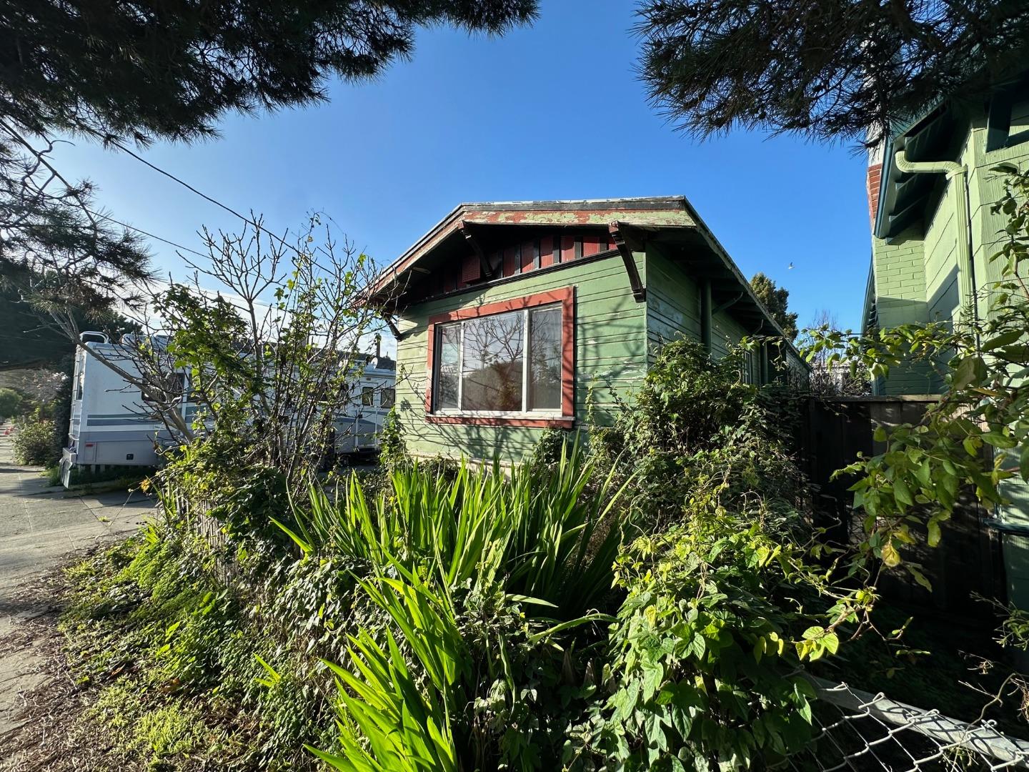 917 Channing Way Berkeley, CA 94710 - Photo 14 of 15 a front view of a house with a yard