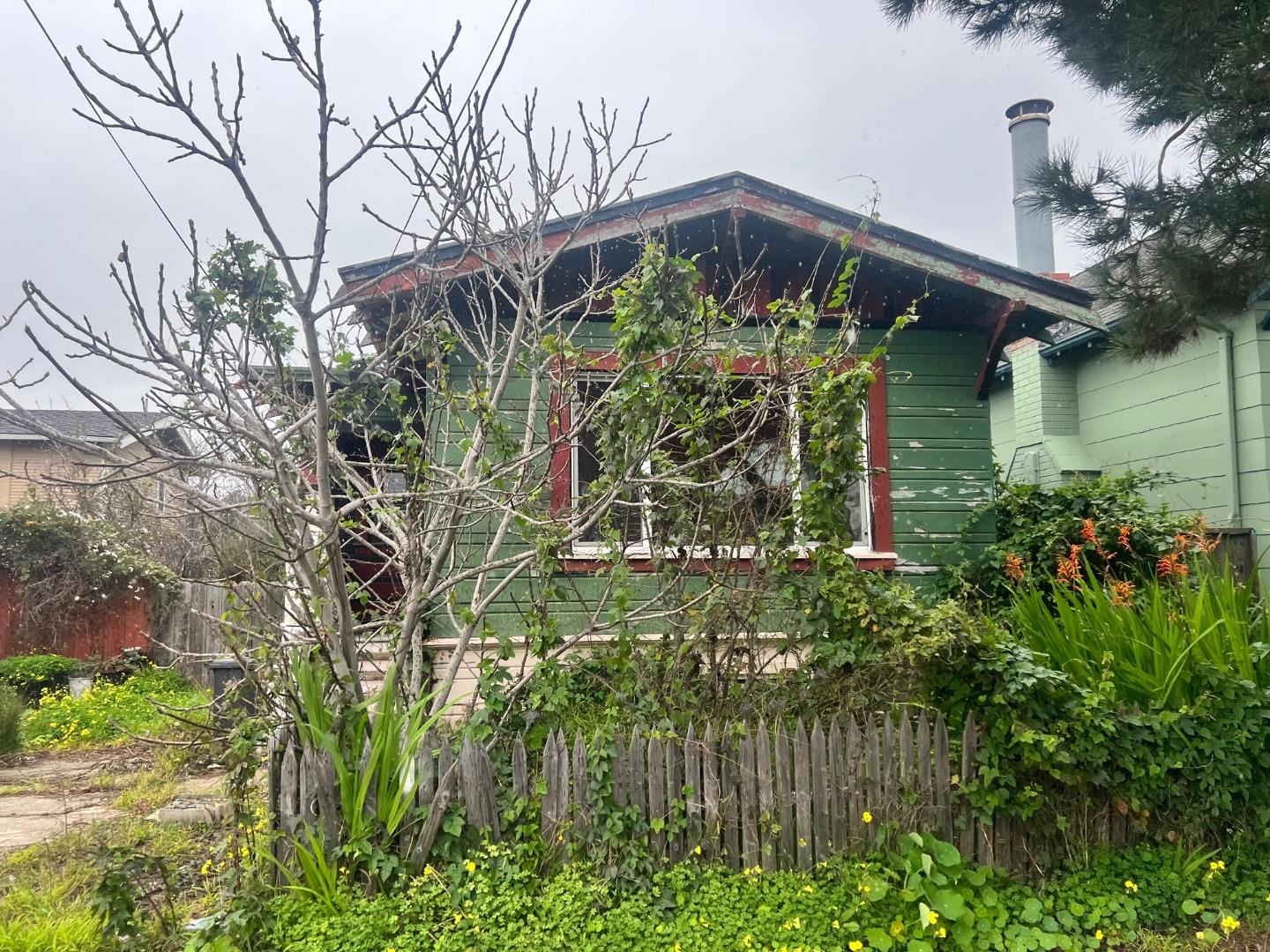 917 Channing Way Berkeley, CA 94710 - Photo 2 of 15 a front view of a house with a yard