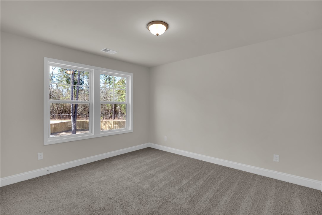 202 Bellflower Lane Pendleton, SC 29670 - Photo 33 of 38 Bright and airy room with inviting views of the natural surroundings.
