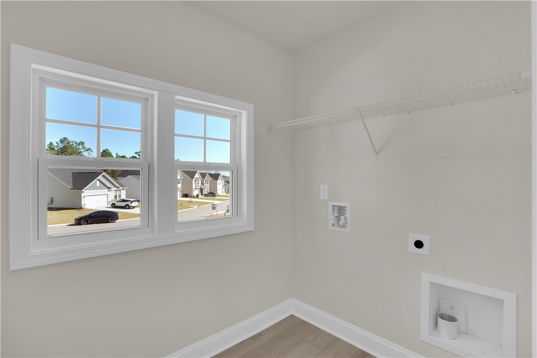 202 Bellflower Lane Pendleton, SC 29670 - Photo 37 of 38 This dedicated laundry area offers ample space and natural light for everyday tasks.