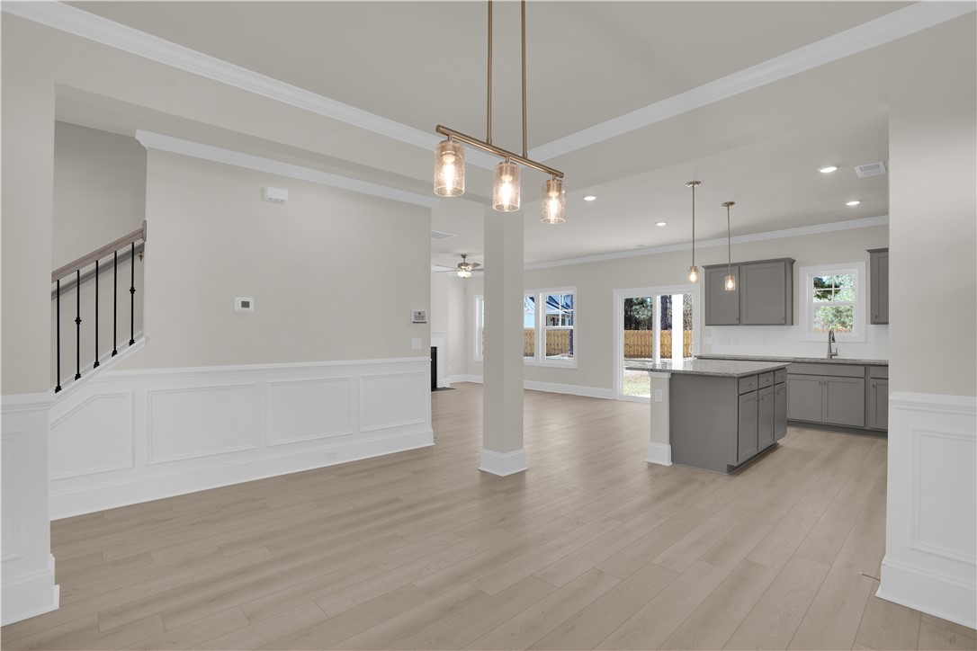 202 Bellflower Lane Pendleton, SC 29670 - Photo 9 of 38 This bright and airy open-concept living space features hardwood flooring and modern fixtures.
