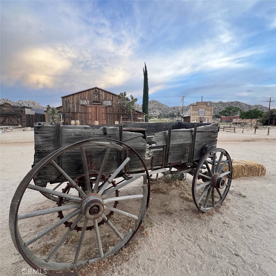 543050 Red Ryder Road Pioneertown, CA 92268 - Photo 15 of 20 a view of a terrace with furniture