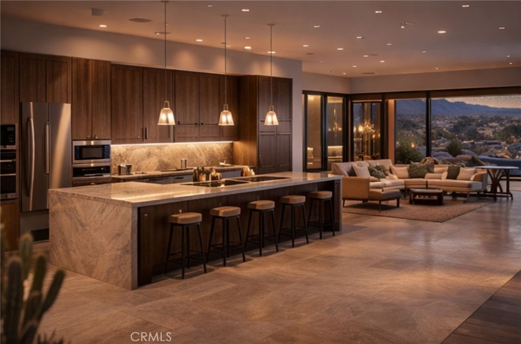 543050 Red Ryder Road Pioneertown, CA 92268 - Photo 3 of 20 a kitchen with stainless steel appliances granite countertop a stove a sink and a refrigerator