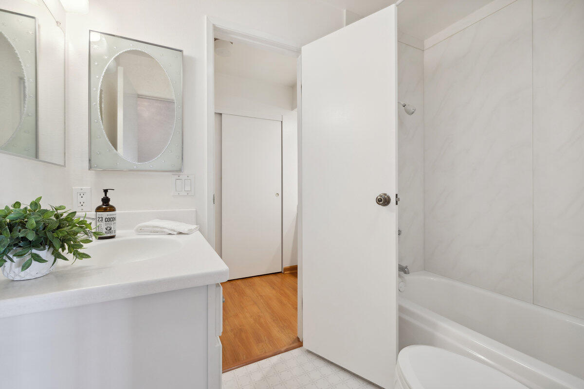 7165 Del Norte Drive Goleta, CA 93117 - Photo 19 of 30 a bathroom with a tub sink and mirror
