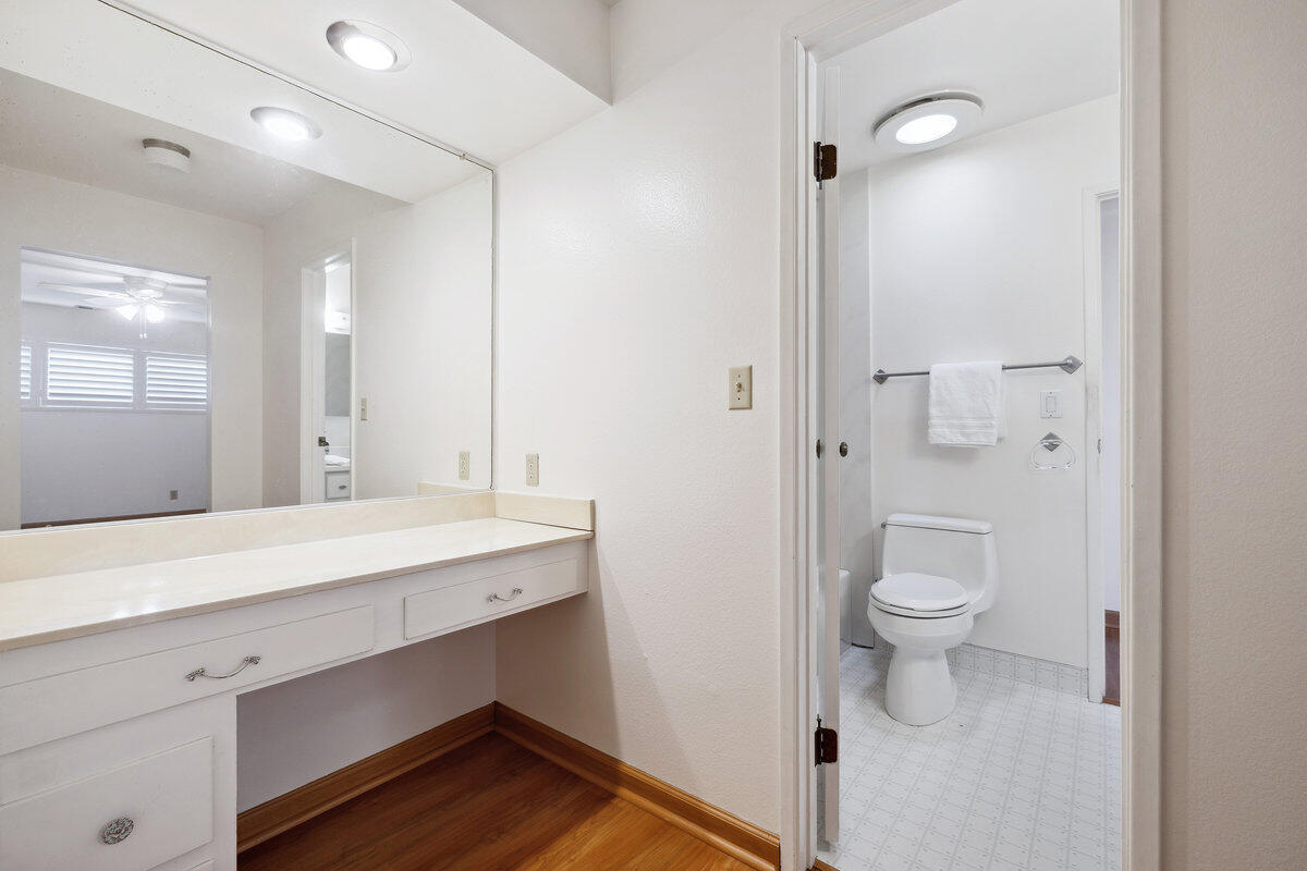 7165 Del Norte Drive Goleta, CA 93117 - Photo 21 of 30 a bathroom with a sink a toilet and shower