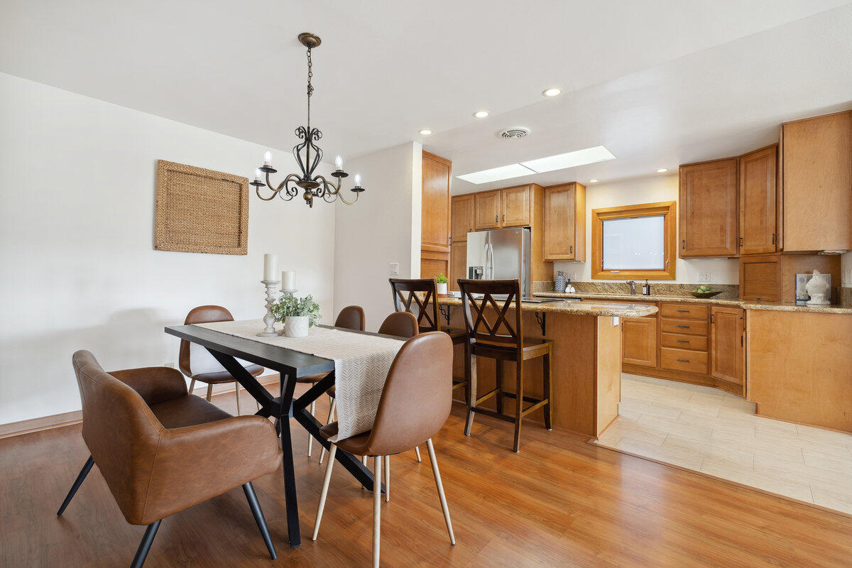 7165 Del Norte Drive Goleta, CA 93117 - Photo 5 of 30 a view of a dining room with furniture and wooden floor