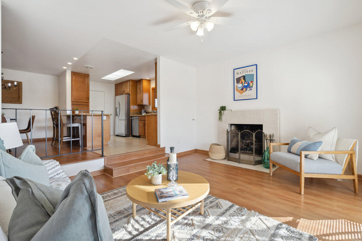 7165 Del Norte Drive Goleta, CA 93117 - Photo 9 of 30 a living room with furniture and a fireplace