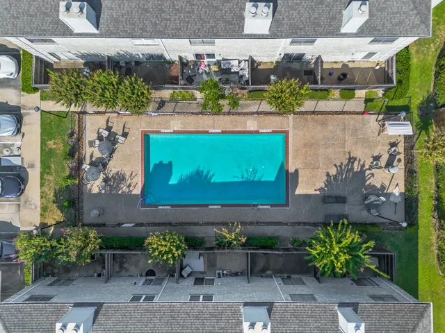 a view of a chairs and table in a outdoor space
