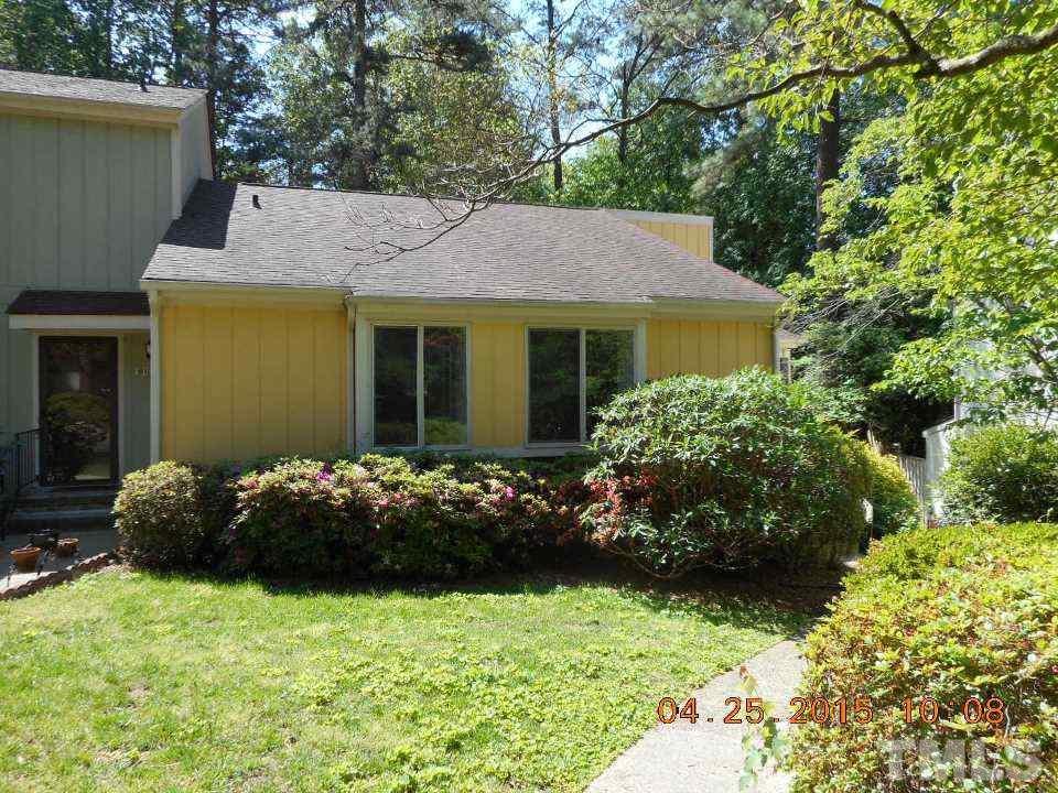 808 Green Ridge Drive Raleigh, NC 27609 - Photo 1 of 10 a front view of a house with a yard