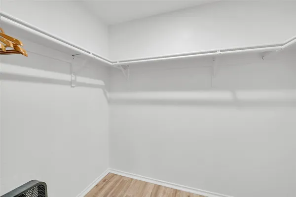 a view of a room with racks on the wall
