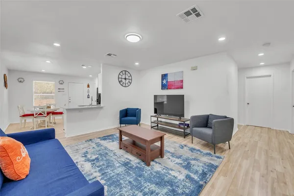 a living room with furniture and a couch