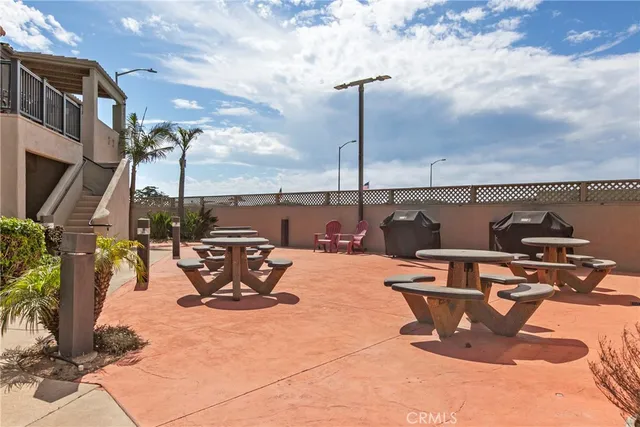 a view of a terrace with furniture