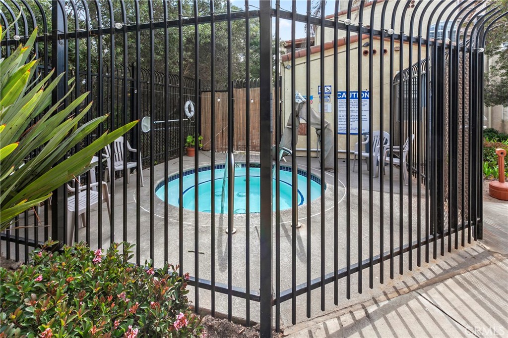 444 Pier Avenue, Unit 3 Oceano, CA 93445 - Photo 14 of 15 a view of a black gate