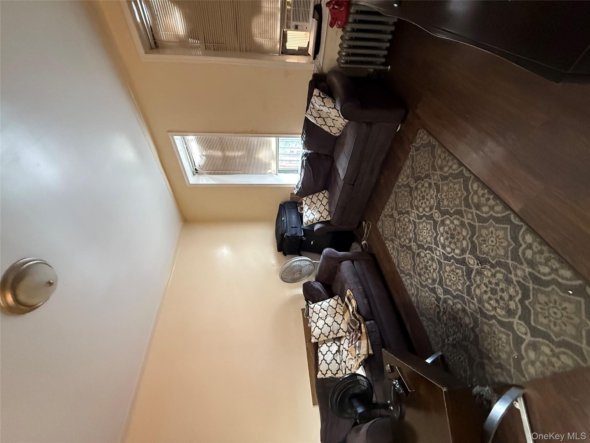 2913 Foster Avenue, Unit 6F Brooklyn, NY 11210 - Photo 3 of 5 a living room with furniture