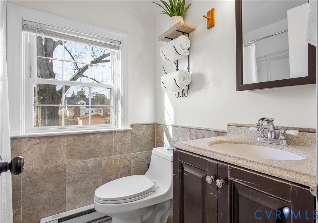 6100 Club Road Henrico, VA 23228 - Photo 16 of 30 a bathroom with a sink vanity mirror and toilet