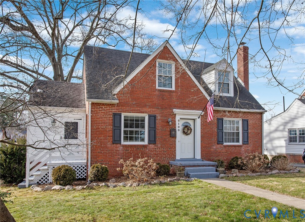6100 Club Road Henrico, VA 23228 - Photo 3 of 30 a front view of a house with a yard
