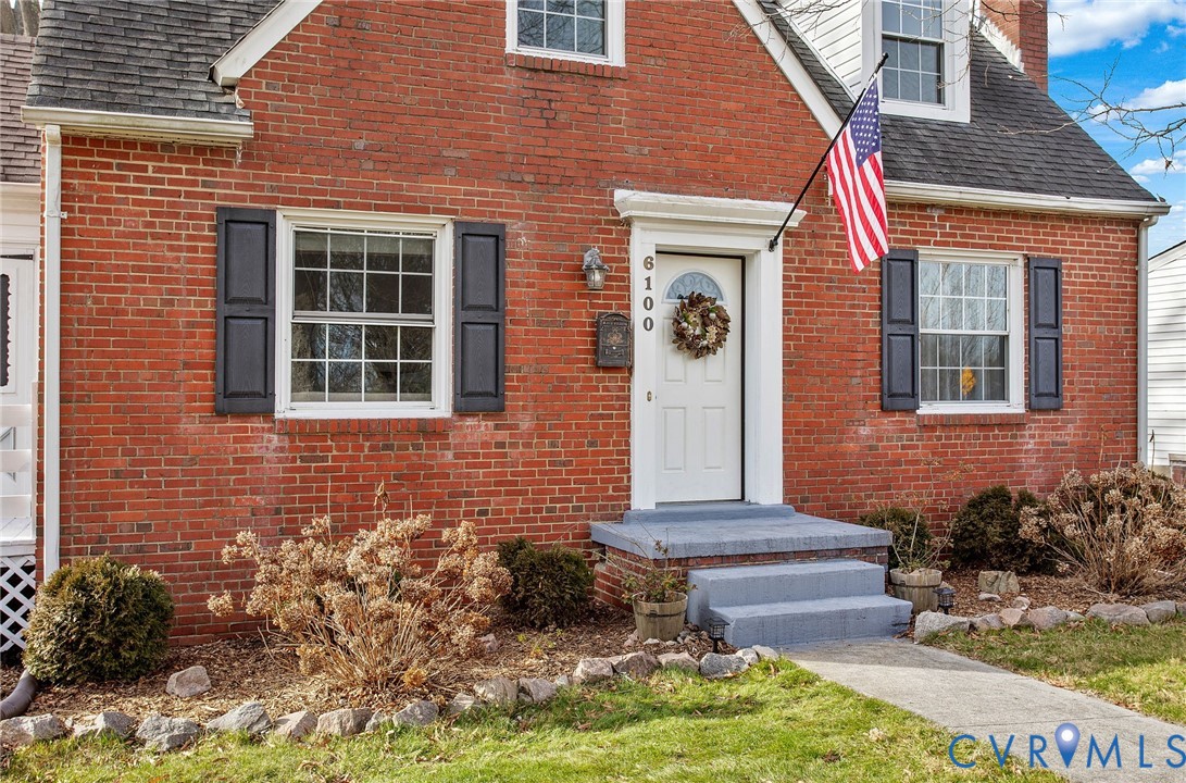 6100 Club Road Henrico, VA 23228 - Photo 4 of 30 a front view of a house with a yard