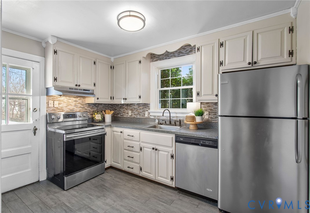 6100 Club Road Henrico, VA 23228 - Photo 10 of 30 a kitchen with cabinets stainless steel appliances and window