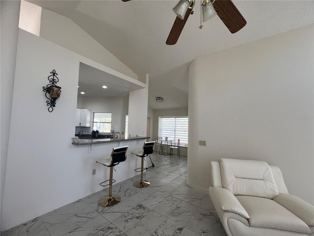 14189 Cornewall Lane Spring Hill, FL 34609 - Photo 12 of 36 a living room with furniture