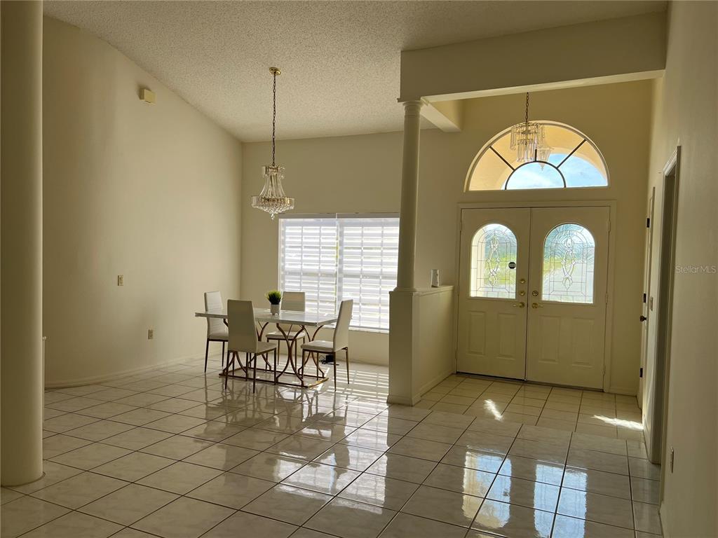 14189 Cornewall Lane Spring Hill, FL 34609 - Photo 6 of 36 a view of a room with furniture and window