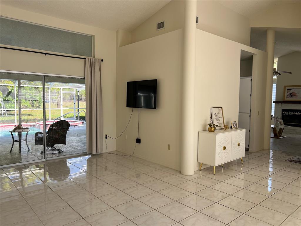 14189 Cornewall Lane Spring Hill, FL 34609 - Photo 7 of 36 a living room with furniture