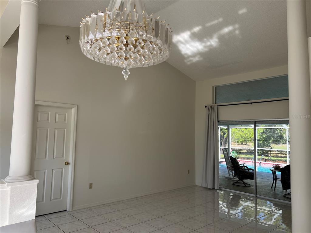 14189 Cornewall Lane Spring Hill, FL 34609 - Photo 8 of 36 a view of empty room with window
