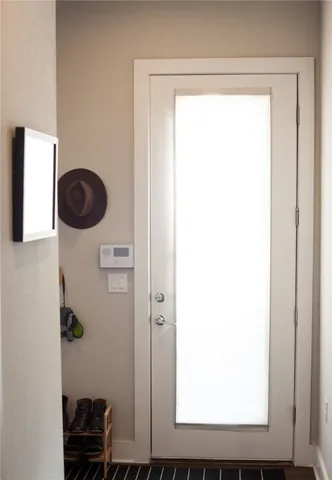 a bathroom with a shower and a sink