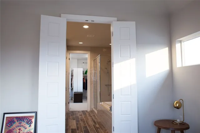 a bathroom with a bathtub and a shower