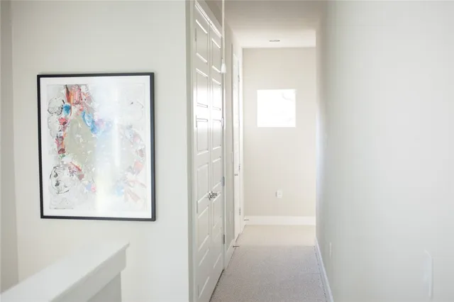 a bedroom with a bed and a mirror