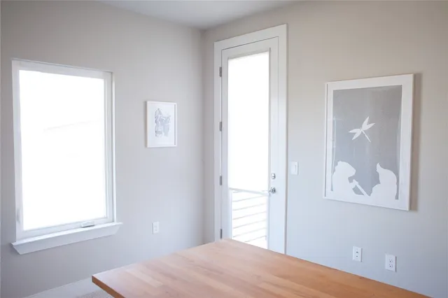a view of a bathroom with a shower curtain
