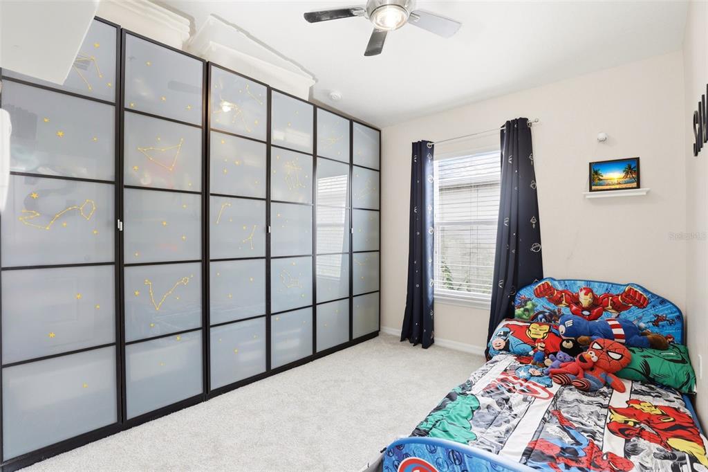 6458 South Goldenrod Road, Unit 29B Orlando, FL 32822 - Photo 23 of 40 a bedroom with a bed and a window