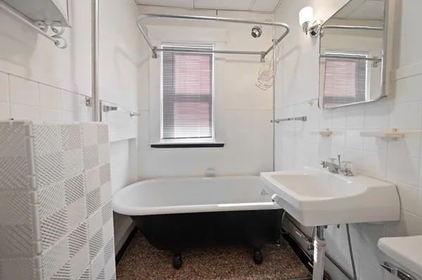 a bathroom with a sink and a bathtub