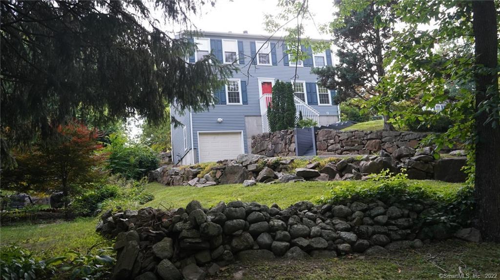 a view of a house with a garden