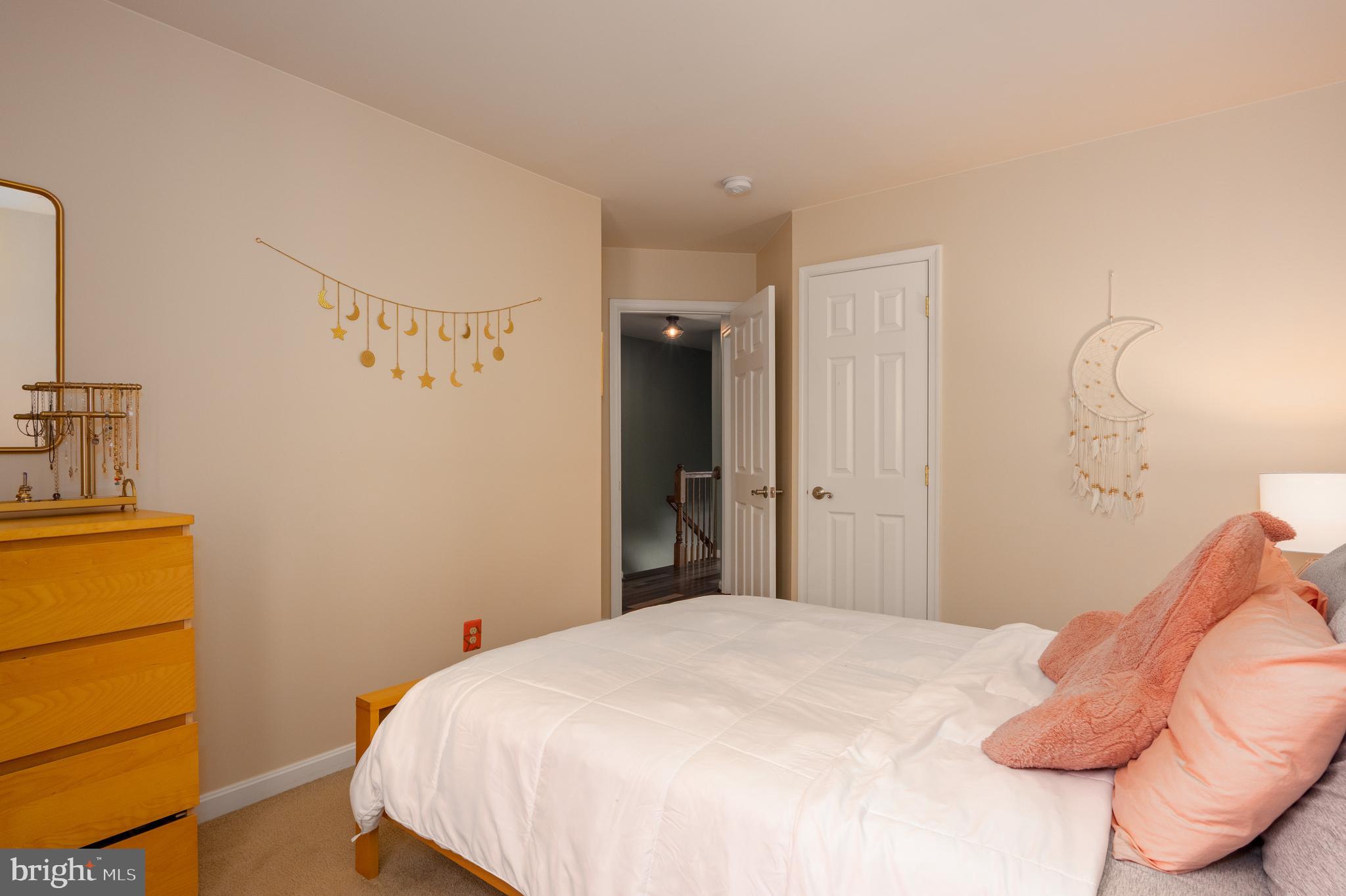 2308 Quilting Bee Road Catonsville, MD 21228 - Photo 16 of 37 a bedroom with a bed and a closet
