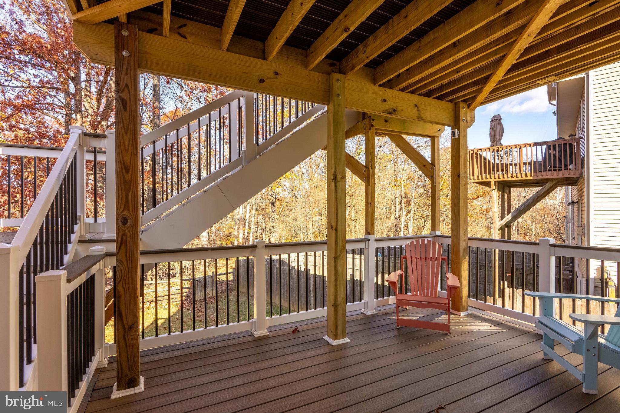 2308 Quilting Bee Road Catonsville, MD 21228 - Photo 26 of 37 a view of balcony with wooden floor and fence