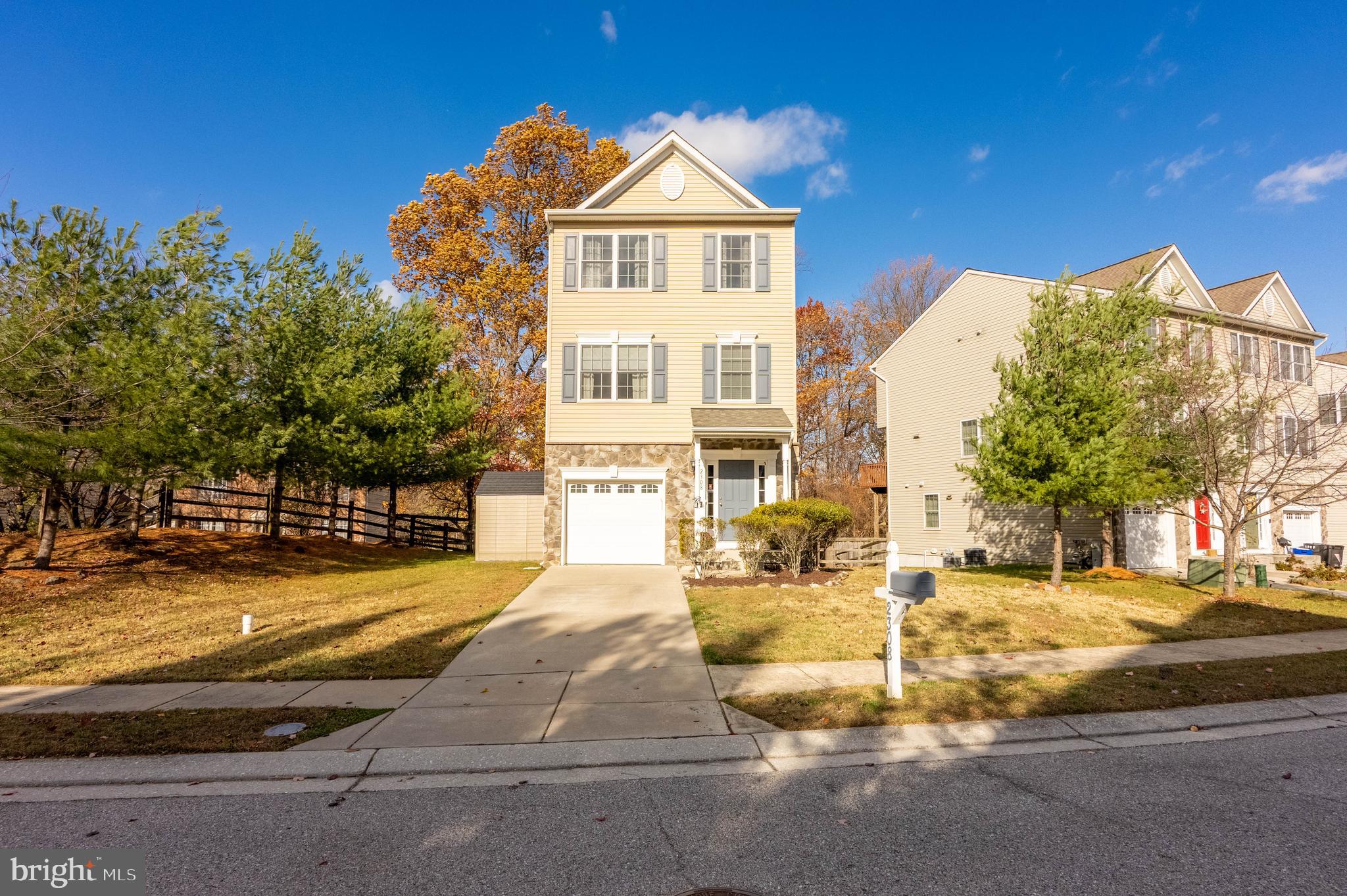 2308 Quilting Bee Road Catonsville, MD 21228 - Photo 29 of 37 a view of a swimming pool with a house in the background