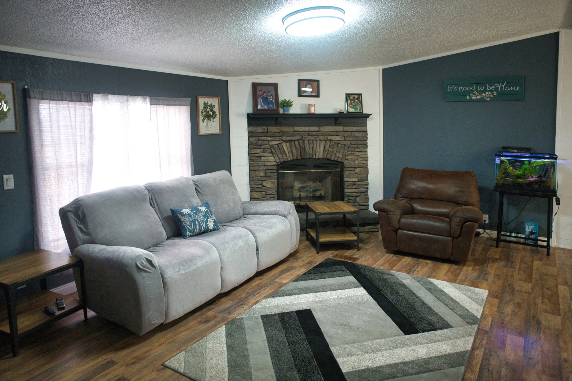 3079 Trace Creek Road White Bluff, TN 37187 - Photo 11 of 35 a living room with furniture and a fireplace