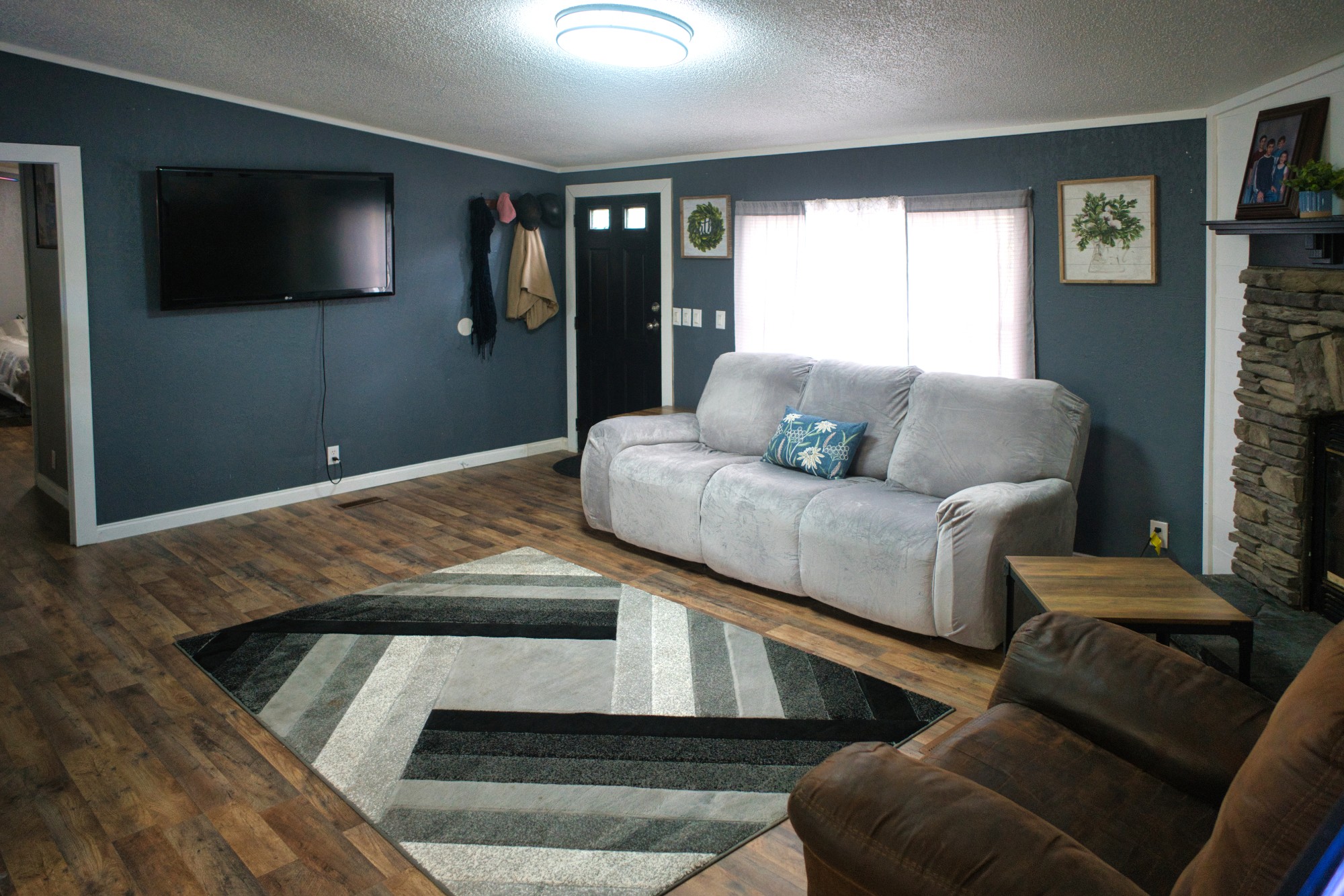 3079 Trace Creek Road White Bluff, TN 37187 - Photo 13 of 35 a living room with furniture and a flat screen tv