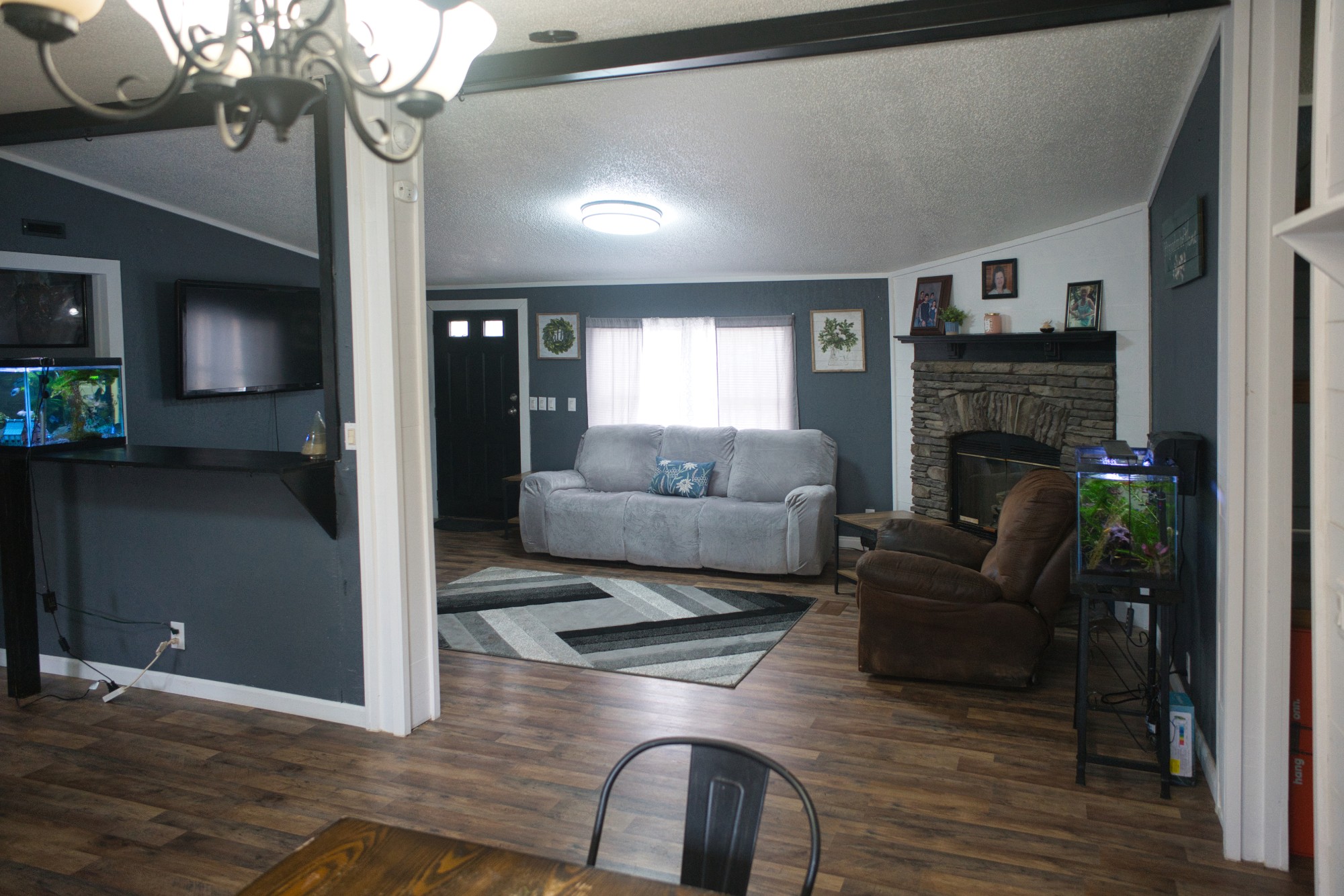 3079 Trace Creek Road White Bluff, TN 37187 - Photo 14 of 35 a living room with furniture and a fireplace