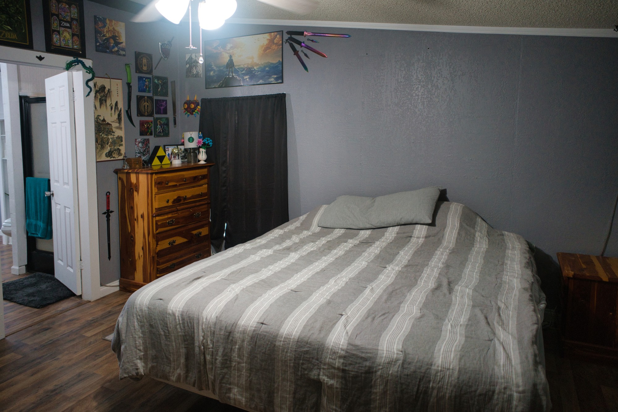 3079 Trace Creek Road White Bluff, TN 37187 - Photo 19 of 35 a bedroom with a bed and a refrigerator