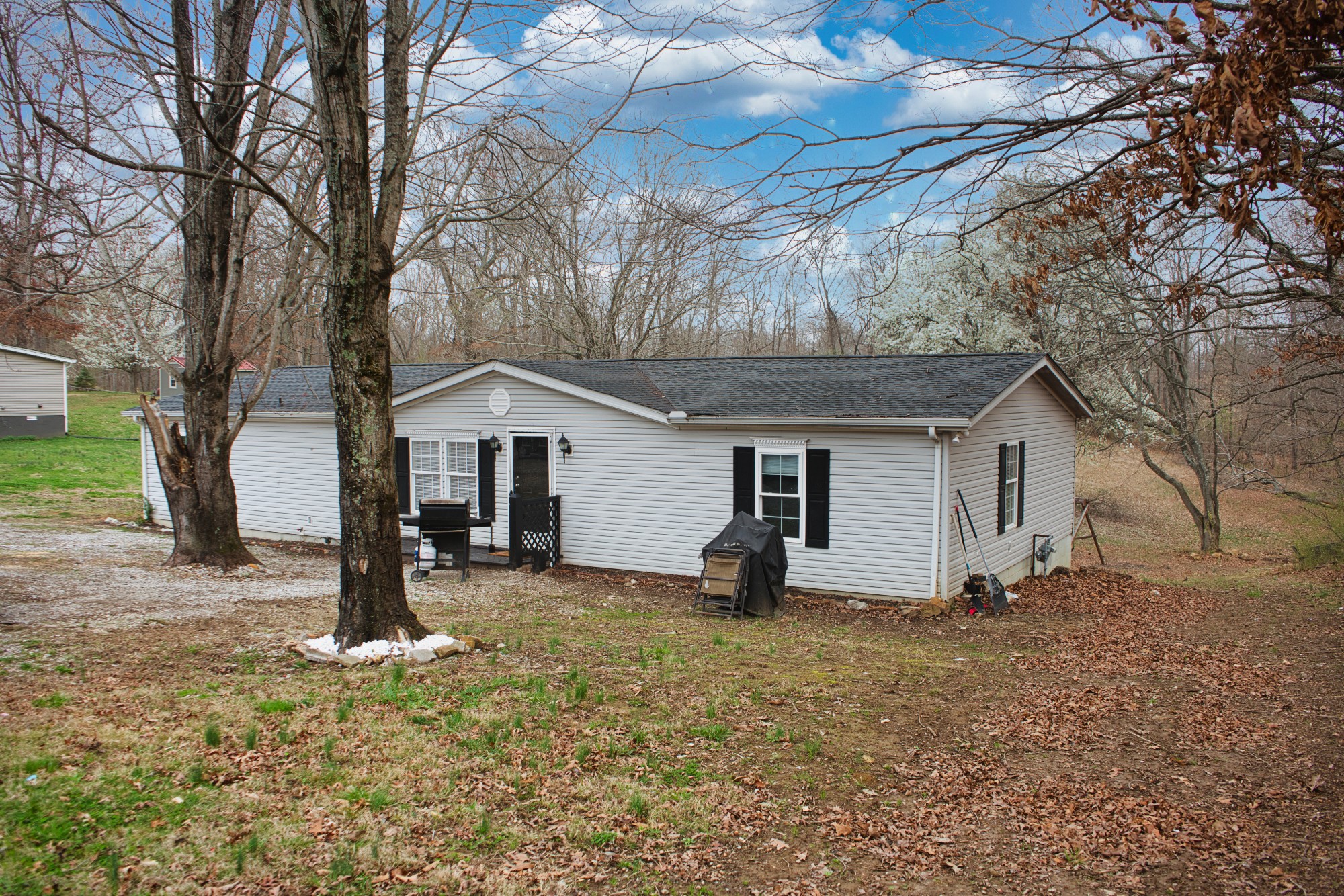 3079 Trace Creek Road White Bluff, TN 37187 - Photo 2 of 35 a house with trees in the background