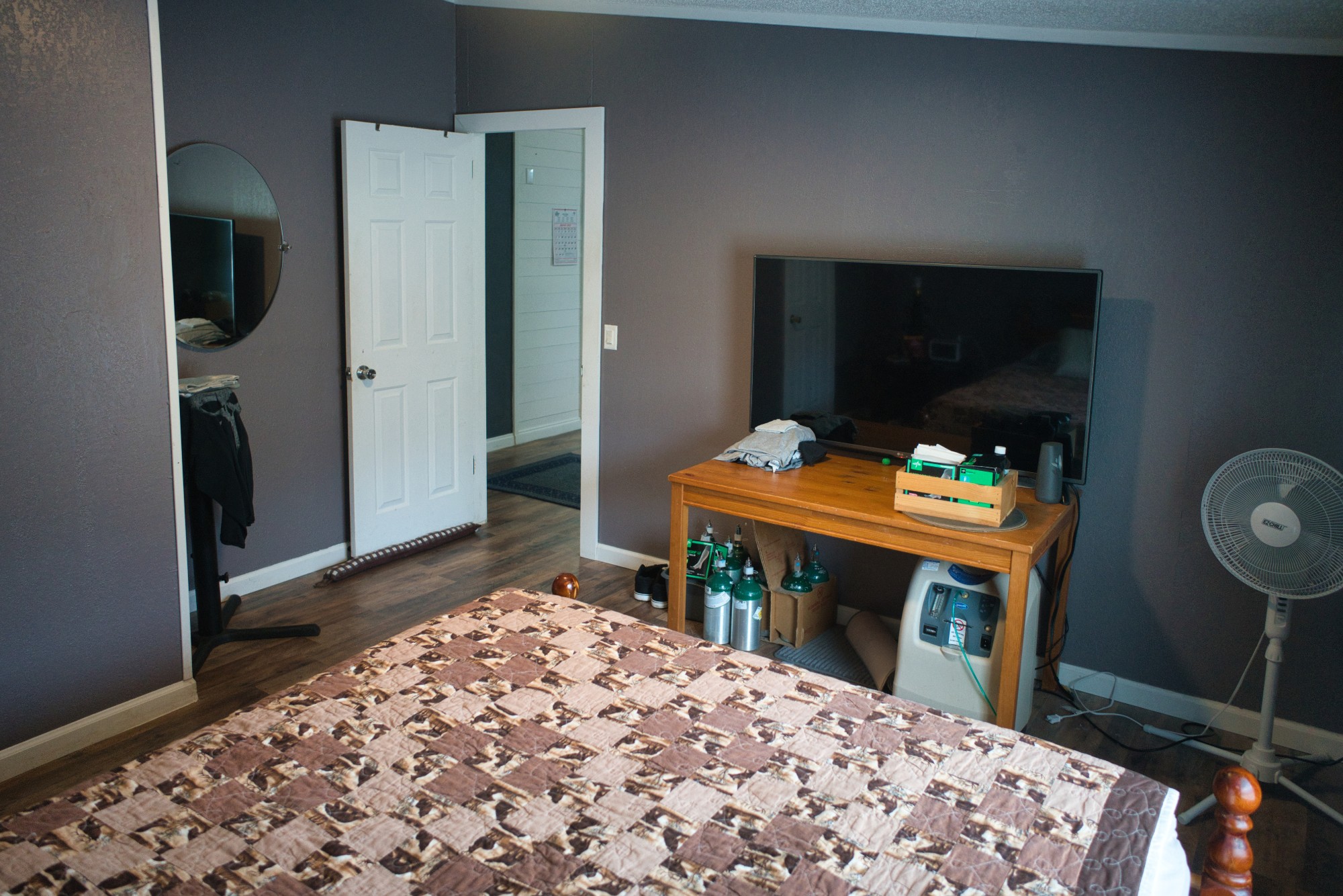 3079 Trace Creek Road White Bluff, TN 37187 - Photo 29 of 35 a bedroom with a bed and a dresser with mirror