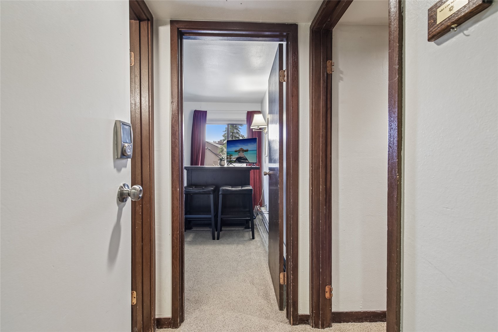 423 Wild Irishman Road, Unit 1008 1009 Keystone, CO 80435 - Photo 23 of 28 a view of a bedroom from a hallway