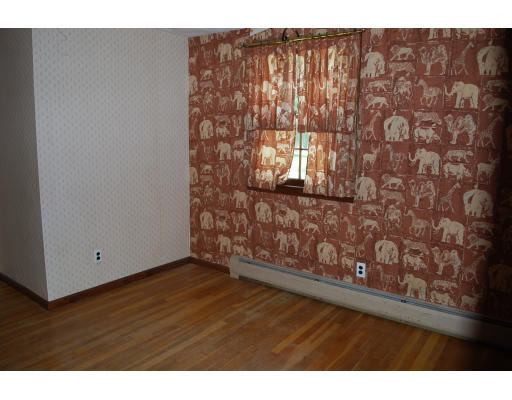 11 Handel Road Billerica, MA 01821 - Photo 7 of 16 a view of wooden floor in a room