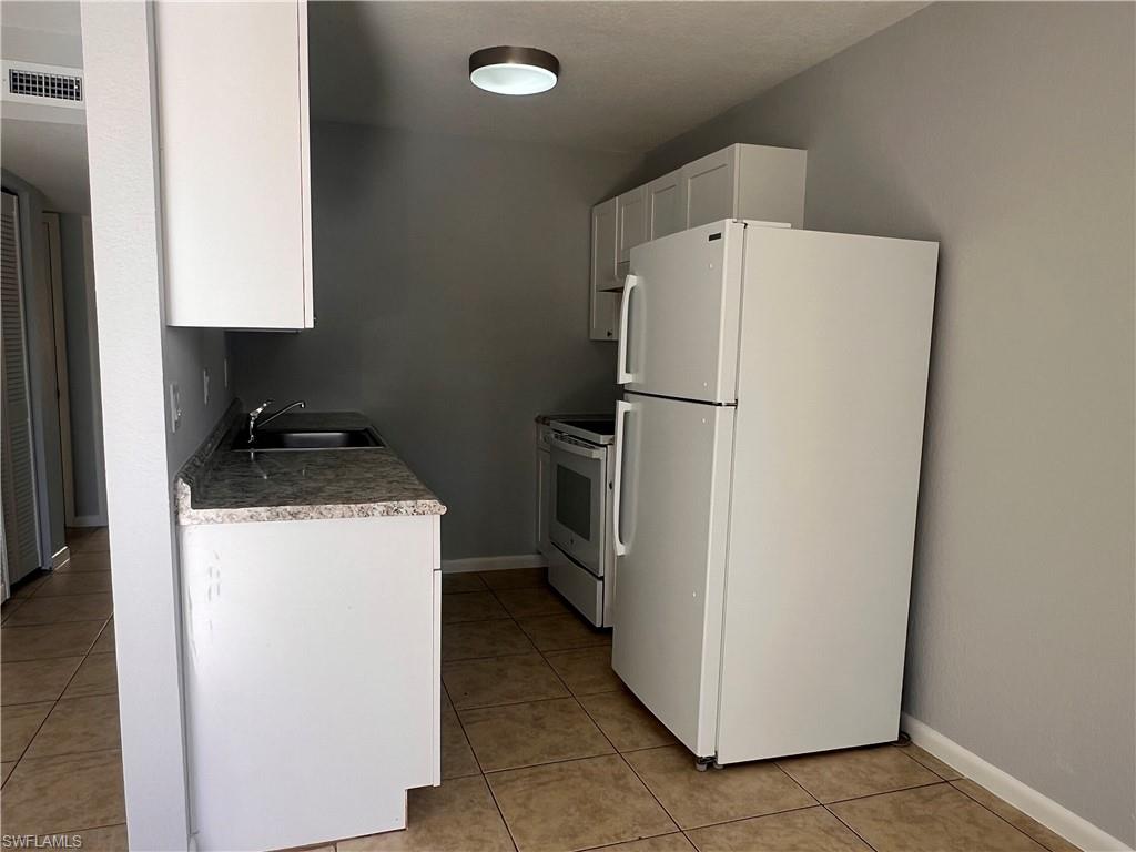 4601 Bayshore Drive, Unit A1 Naples, FL 34112 - Photo 3 of 13