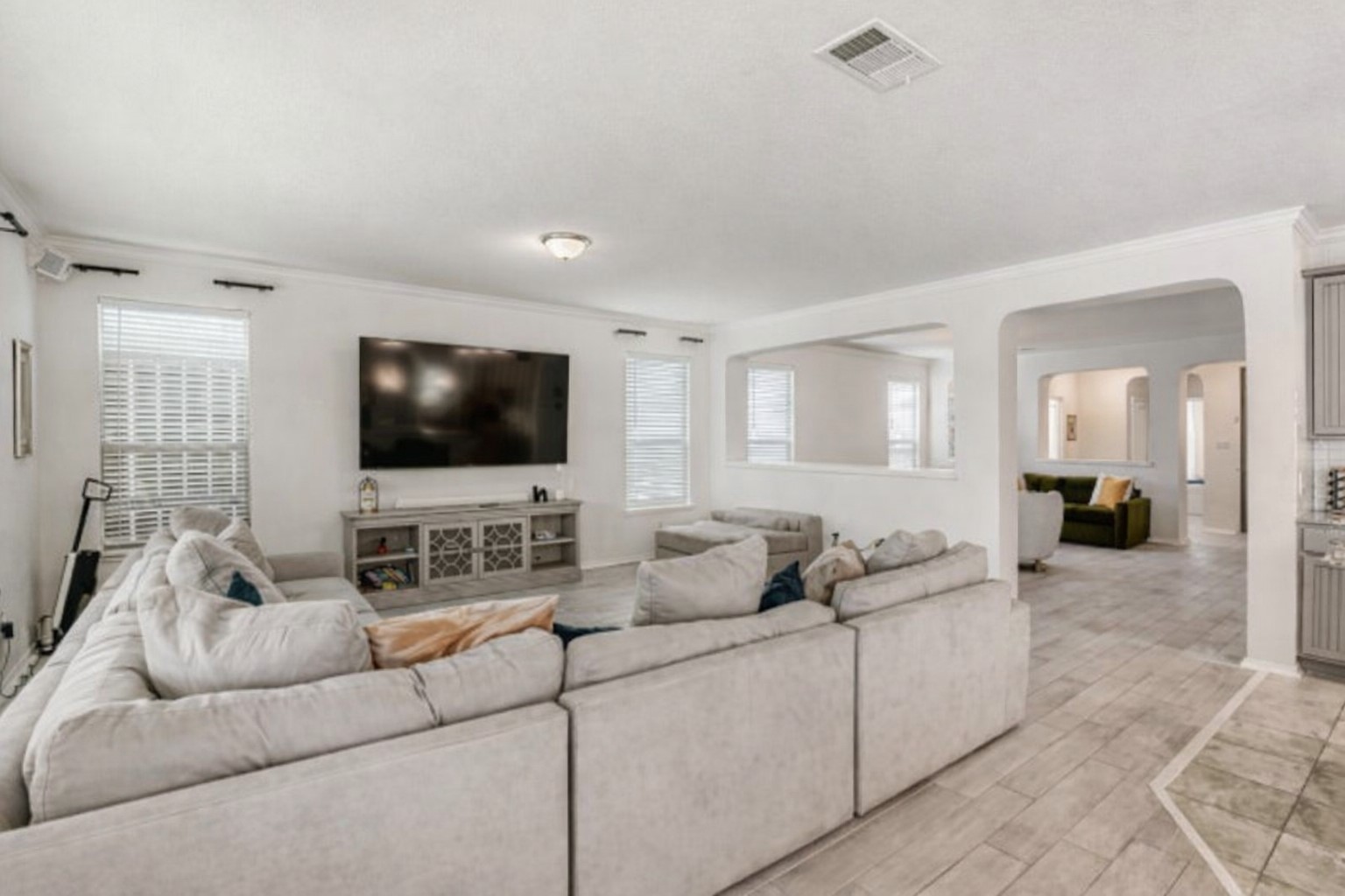 159 Kennicott Drive Kyle, TX 78640 - Photo 12 of 27 a living room with furniture and a flat screen tv